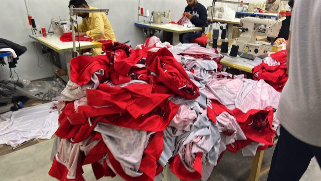 Scarlett Solo Wear factory production floor with garment finishing and quality work